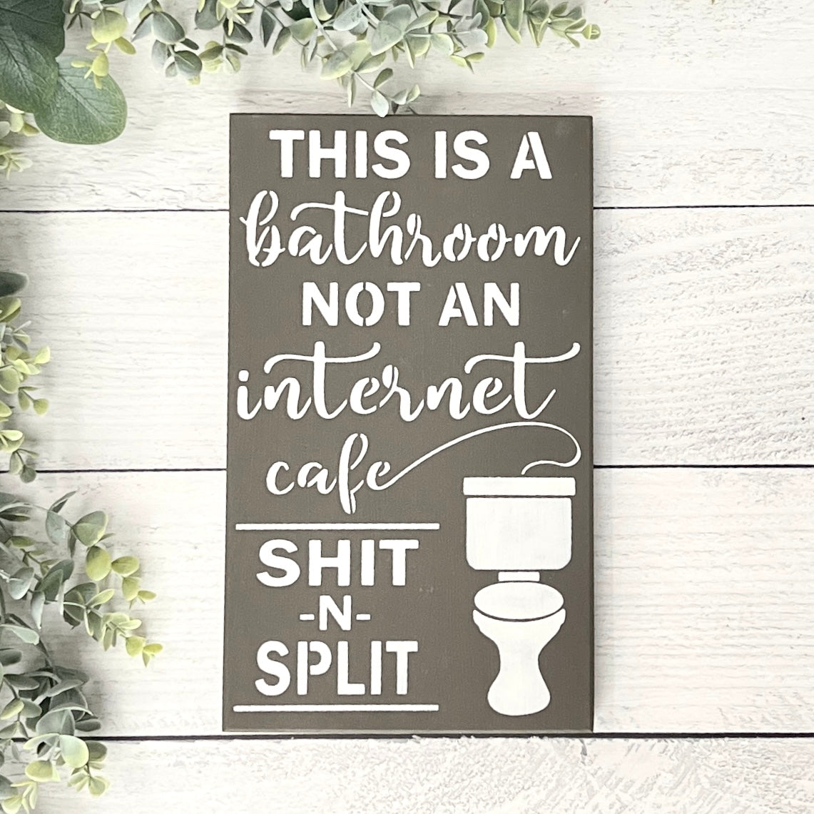 Shit-n-split funny bathroom sign